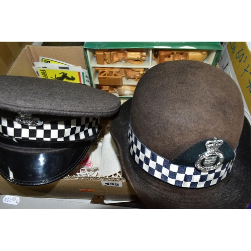 435 - A BOX OF POLICE OFFICER'S HATS, AND SUNDRY ITEMS, to include a Sussex Police cap, interior label 'We... 