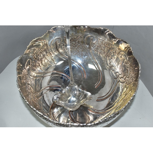 446 - A GROUP OF SILVER PLATED ITEMS, to include a pair of cut glass plated claret jugs, a large punch bow... 