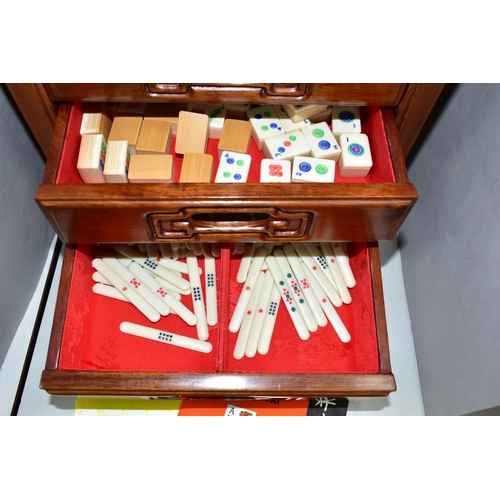 448 - A MAH JONG SET, the set of bamboo tiles contained in a wooden case with five drawers, height 32.5cm ... 