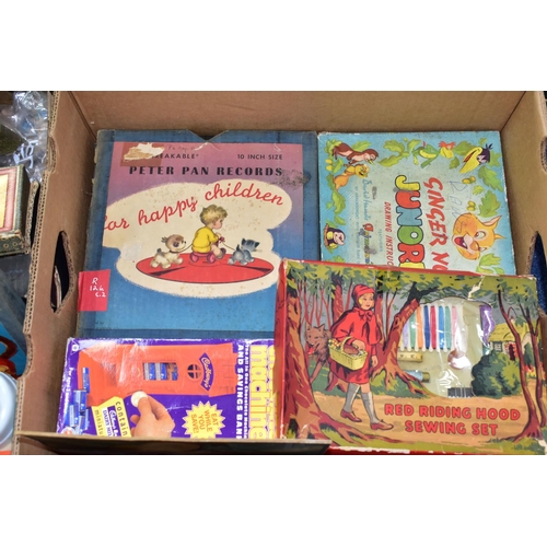 493 - THREE BOXES OF VINTAGE TOYS AND GAMES, to include a boxed Pelham Puppet Witch, in distressed box and... 