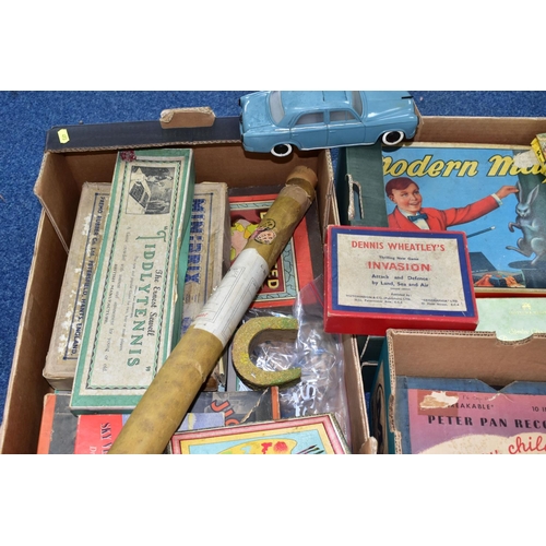 493 - THREE BOXES OF VINTAGE TOYS AND GAMES, to include a boxed Pelham Puppet Witch, in distressed box and... 