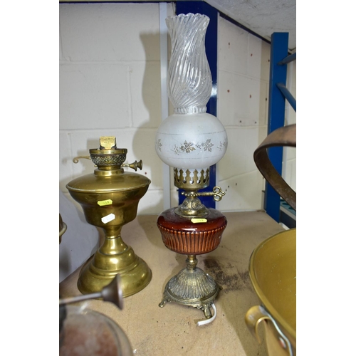 519 - A GROUP OF OIL LAMP BASES, ELECTRIC TABLE LAMP AND BRASS JAM PAN, comprising two brass oil lamp base... 