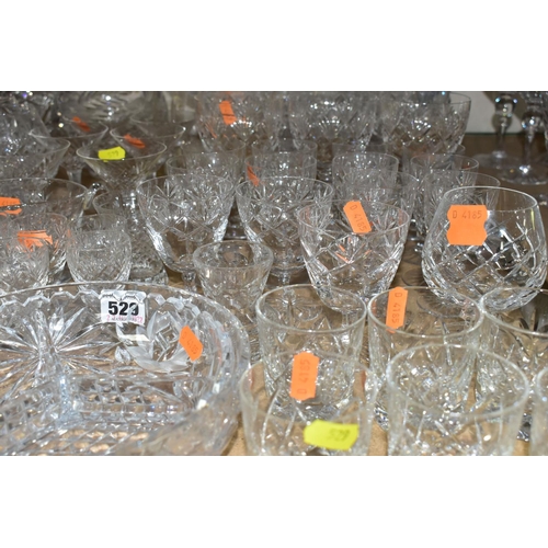 529 - A QUANTITY OF CUT CRYSTAL AND GLASSWARE,  comprising three very large 'Cumbria Crystal' wine glasses... 