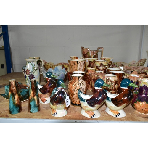 562 - A LARGE QUANTITY OF J FRYER AND SON OLDCOURT WARE, approximately forty pieces, including jugs, vases... 