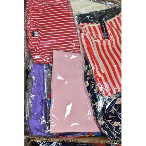 590 - A LARGE COLLECTION OF VINTAGE LADIES CLOTHING, to include three boxes of clean and packaged ladies t... 