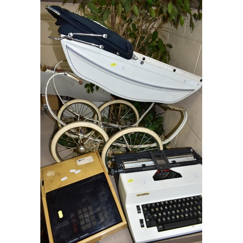 597 - A DOLL'S SILVER CROSS PRAM, ELECTRONIC TYPEWRITER AND VINTAGE CALCULATOR, comprising a coach built d... 