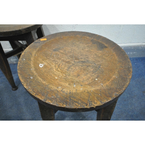 1333 - A PAIR OF 19TH CENTURY OAK CIRCULAR STOOLS, on four tapered legs, and padded feet united by cross st... 