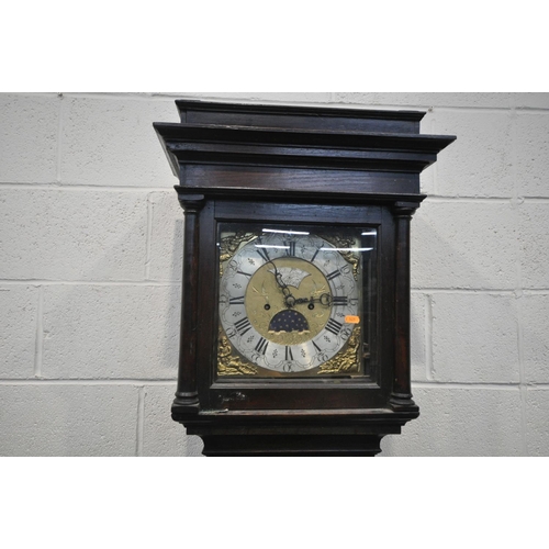 1498 - A GEORGIAN AND LATER OAK EIGHT DAY LONGCASE CLOCK, the hood enclosing a brass and silvered 10.5 inch... 