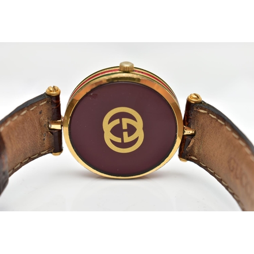 119 - A GOLD PLATED 'GUCCI' WRISTWATCH, quartz movement, round cream dial signed 'Gucci', Roman numerals, ... 