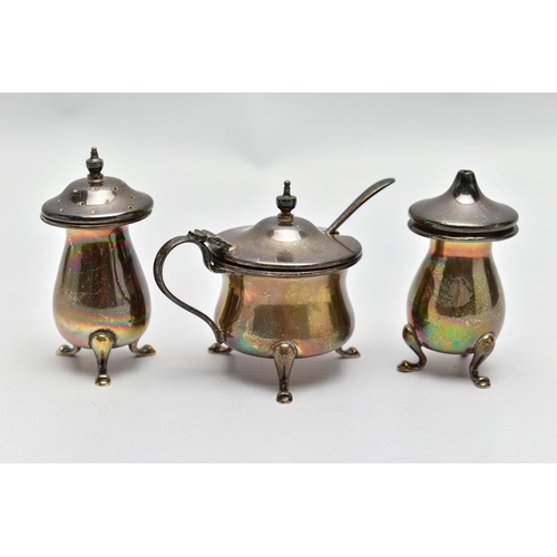 123 - A MID 20TH CENTURY SILVER THREE PIECE CONDIMENT SET, comprising a salt shaker and pepperette, each d... 