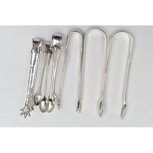 124 - A SELECTION OF SILVER AND WHITE METAL SUGAR TONGS, a pair of plain polished silver sugar tongs, hall... 