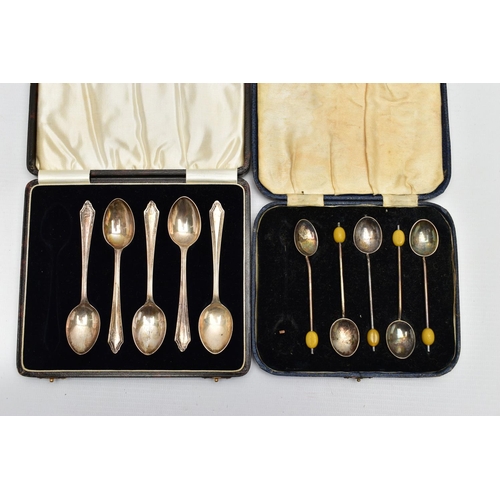 126 - TWO PARTIAL SETS OF TEASPOONS BOTH CASED, the first comprising five silver teaspoons with tapered ha... 