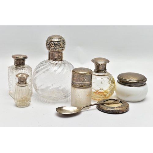 127 - A SELECTION OF GLASS BOTTLES, A SILVER SPOON AND PHOTO FRAME, comprising five glass bottles with sil... 