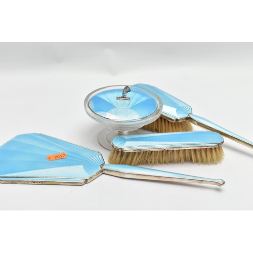 134 - A FOUR PIECE SILVER GUILLOCHE ENAMEL VANITY SET, comprising of a hair brush, clothes brush, hand hel... 