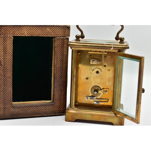 136 - A CARRIAGE CLOCK WITH CASE, a brass carriage clock with glass viewing panels, white dial with Arabic... 