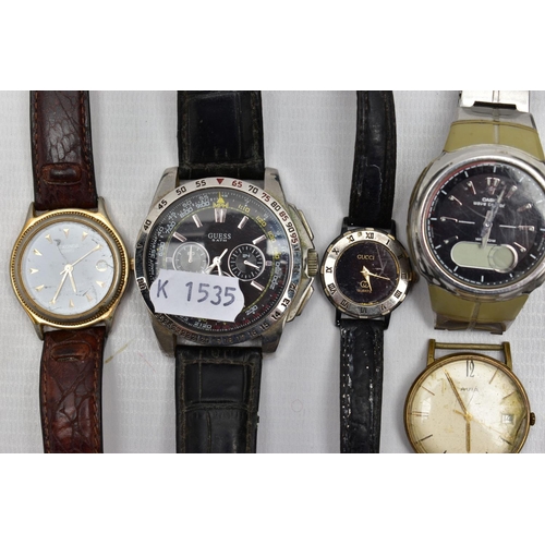 167 - A SELECTION OF WRISTWATCHES, mostly quartz movements with names to include 'Casio, Guess, Sekonda, E... 