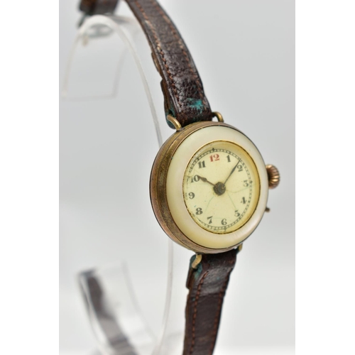 19 - AN EARLY 20TH CENTURY MANUAL WINDING WRISTWATCH, the white enamel dial, with hourly applied Roman nu... 