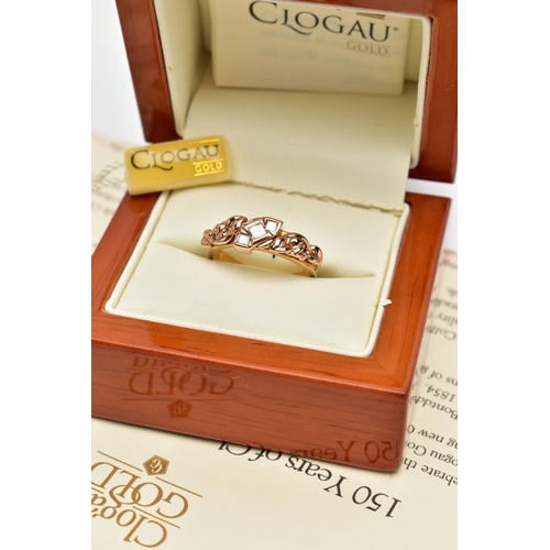 23 - A 18CT GOLD 'CLOGAU' THREE STONE DIAMOND RING, a limited edition Welsh gold tree of life ring, rose ... 