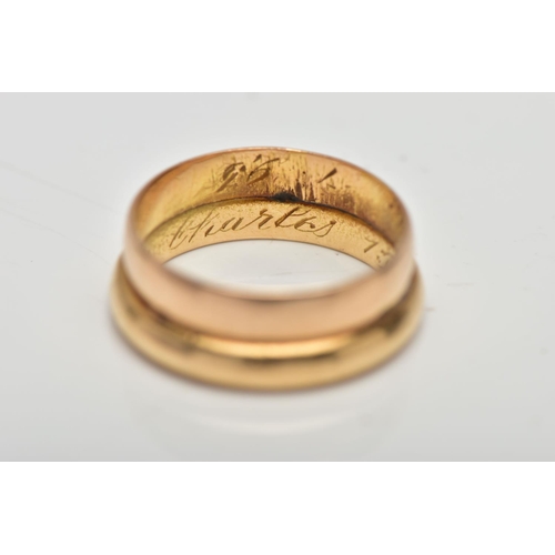 33 - A DOUBLE BAND RING, two polished yellow gold bands soldered together, one stamped 18k, the other unm... 