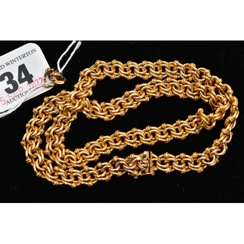 34 - A YELLOW METAL FANCY LINK CHAIN, intertwined multi-link hollow chain, fitted with an integrated box ... 