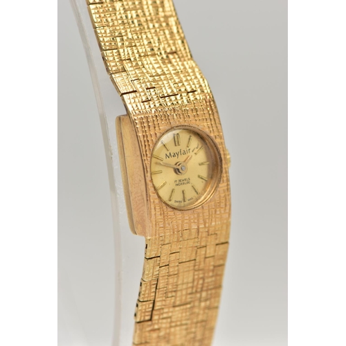 40 - A MID 20TH CENTURY 9CT YELLOW GOLD WRISTWATCH, with circular champaign coloured dial, gold coloured ... 