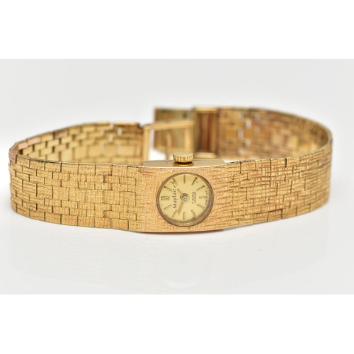 40 - A MID 20TH CENTURY 9CT YELLOW GOLD WRISTWATCH, with circular champaign coloured dial, gold coloured ... 