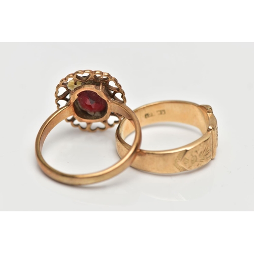 42 - TWO YELLOW METAL RINGS, to include a buckle ring, stamped 9ct, together with a garnet single stone r... 