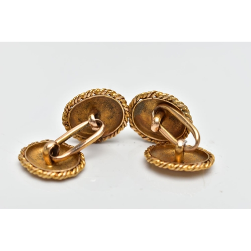 45 - A PAIR OF LATE 19TH CENTURY GOLD CUFFLINKS, face and back designed as a polished oval with rope deta... 