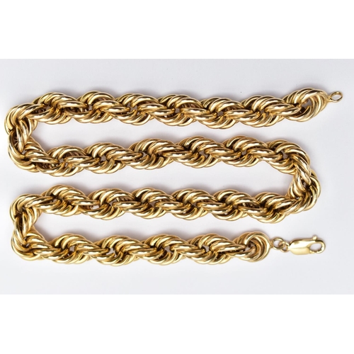 51 - A YELLOW METAL NECKLACE, designed as a hollow rope twist chain, to the lobster clasp, stamped 14k, c... 