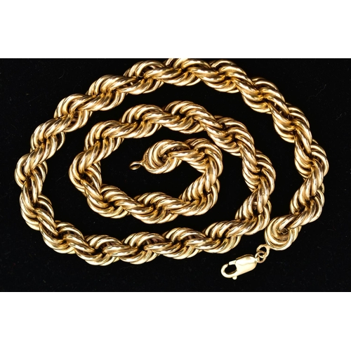 51 - A YELLOW METAL NECKLACE, designed as a hollow rope twist chain, to the lobster clasp, stamped 14k, c... 