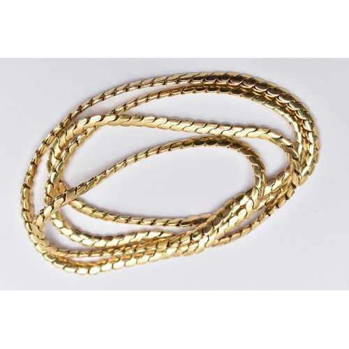 52 - A YELLOW METAL NECKLACE, snake link chain, stamped 14k, approximate width of chain 3.3mm, length 670... 