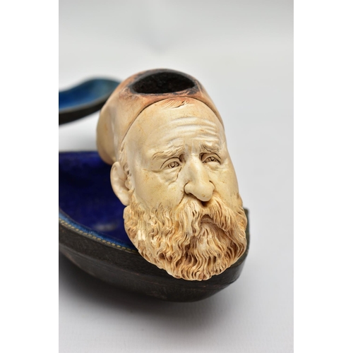 57 - A MEERSCHAUM SMOKING PIPE, a carved meerschaum smoking pipe depicting a bearded man's face, possibly... 