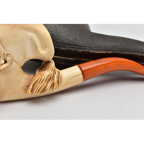 57 - A MEERSCHAUM SMOKING PIPE, a carved meerschaum smoking pipe depicting a bearded man's face, possibly... 