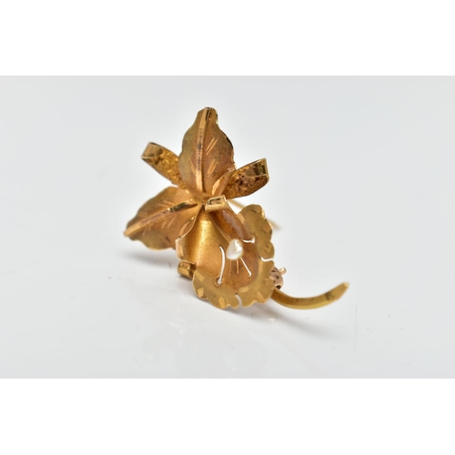 62 - A YELLOW METAL FLOWER BROOCH, a floral brooch detailing a flower, leaves and stem, set with a single... 