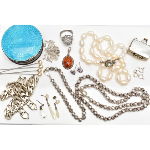 65 - A SELECTION OF SILVER AND WHITE METAL JEWELLERY, to include an early 20th century silver circular tr... 