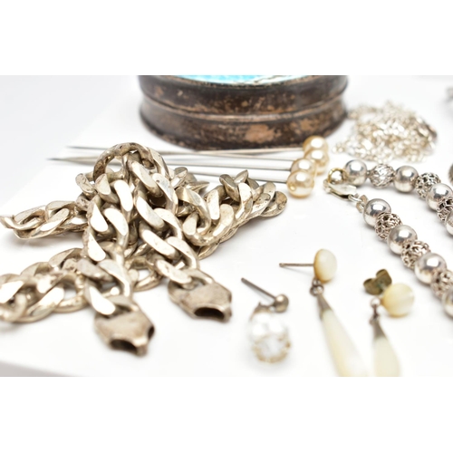 65 - A SELECTION OF SILVER AND WHITE METAL JEWELLERY, to include an early 20th century silver circular tr... 