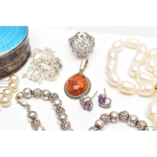 65 - A SELECTION OF SILVER AND WHITE METAL JEWELLERY, to include an early 20th century silver circular tr... 