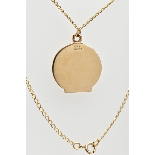 8 - A 9CT YELLOW GOLD LOCKET AND CHAIN, the circular locket with scrolling engraved detail, hallmarked 9... 