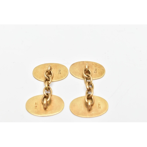 80 - A PAIR OF EARLY 20TH CENTURY GOLD CUFFLINKS, yellow gold oval links with monogram engraving, fitted ... 