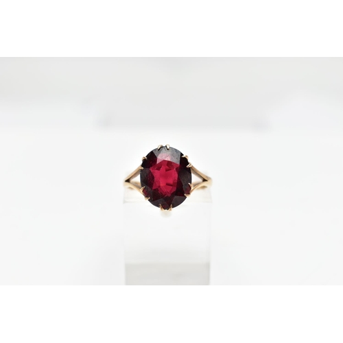 90 - A 9CT GOLD DIAMOND RING AND YELLOW METAL GARNET RING, a single stone diamond ring, round brilliant c... 