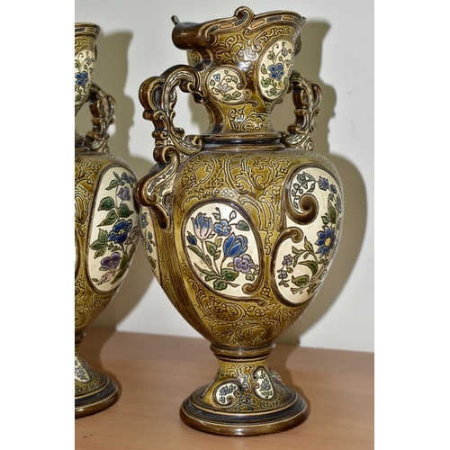 331 - A PAIR OF LATE NINETEENTH CENTURY AUSTRIAN MAJOLICA VASES BY GERBING & STEPHAN, the twin handled vas... 