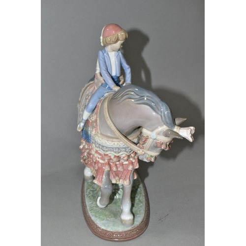 337 - A LLADRO 'VALENCIAN CHILDREN' FIGURE GROUP, number 1489, depicting two children riding a horse, scul... 