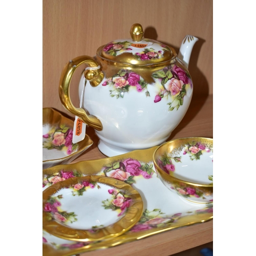 343 - EIGHT PIECES OF ROYAL CHELSEA GOLDEN ROSE PATTERN TEA WARES, comprising a teapot, a sandwich plate, ... 