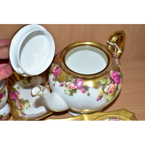 343 - EIGHT PIECES OF ROYAL CHELSEA GOLDEN ROSE PATTERN TEA WARES, comprising a teapot, a sandwich plate, ... 