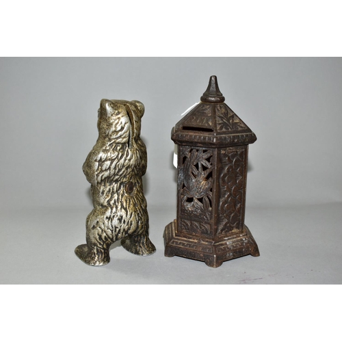 344 - TWO LATE 19TH/EARLY 20TH CENTURY METAL MONEY BOXES / BANKS, comprising a cast iron hexagonal post bo... 