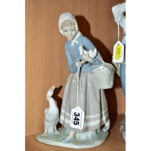 345 - TWO LLADRO FIGURINES, comprising Typical Peddler 4859, issued in 1974, retired in 1985, sculptor Sal... 