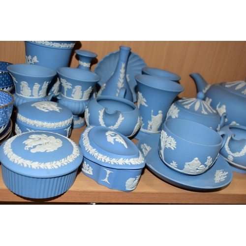 346 - A GROUP OF WEDGWOOD PALE BLUE JASPERWARES, eighteen pieces to include a teapot, two cream jugs, two ... 