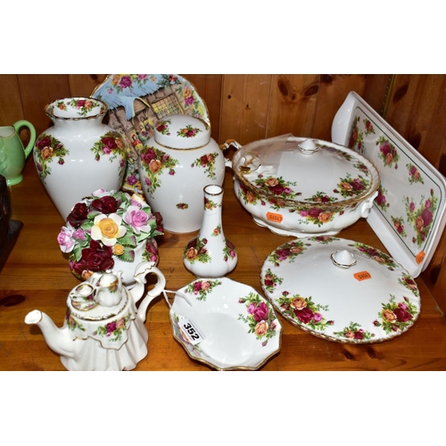 352 - A GROUP OF ROYAL ALBERT OLD COUNTRY ROSES GIFTWARES AND DINNERWARES, comprising a small novelty teap... 