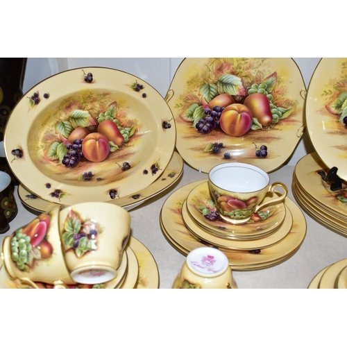 357 - A THIRTY TWO PIECE AYNSLEY 'ORCHARD GOLD' PART DINNER SERVICE, comprising a cake plate, two vegetabl... 