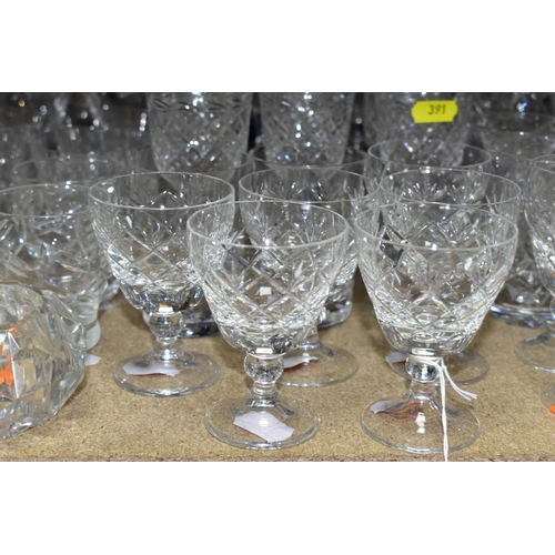 391 - A QUANTITY OF ASSORTED CUT GLASS DRINKING GLASSES, JUGS, GRAPEFRUIT DISHES, ETC, including pickle ja... 